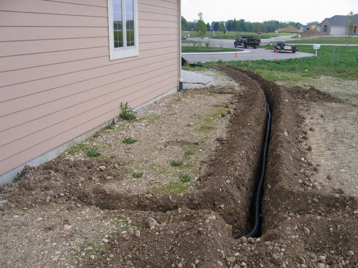 Trenching is a great way to fix drainage issues. - Bob's Grading